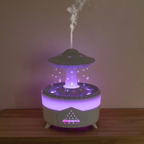 White UFO raindrop aroma diffuser with purple light